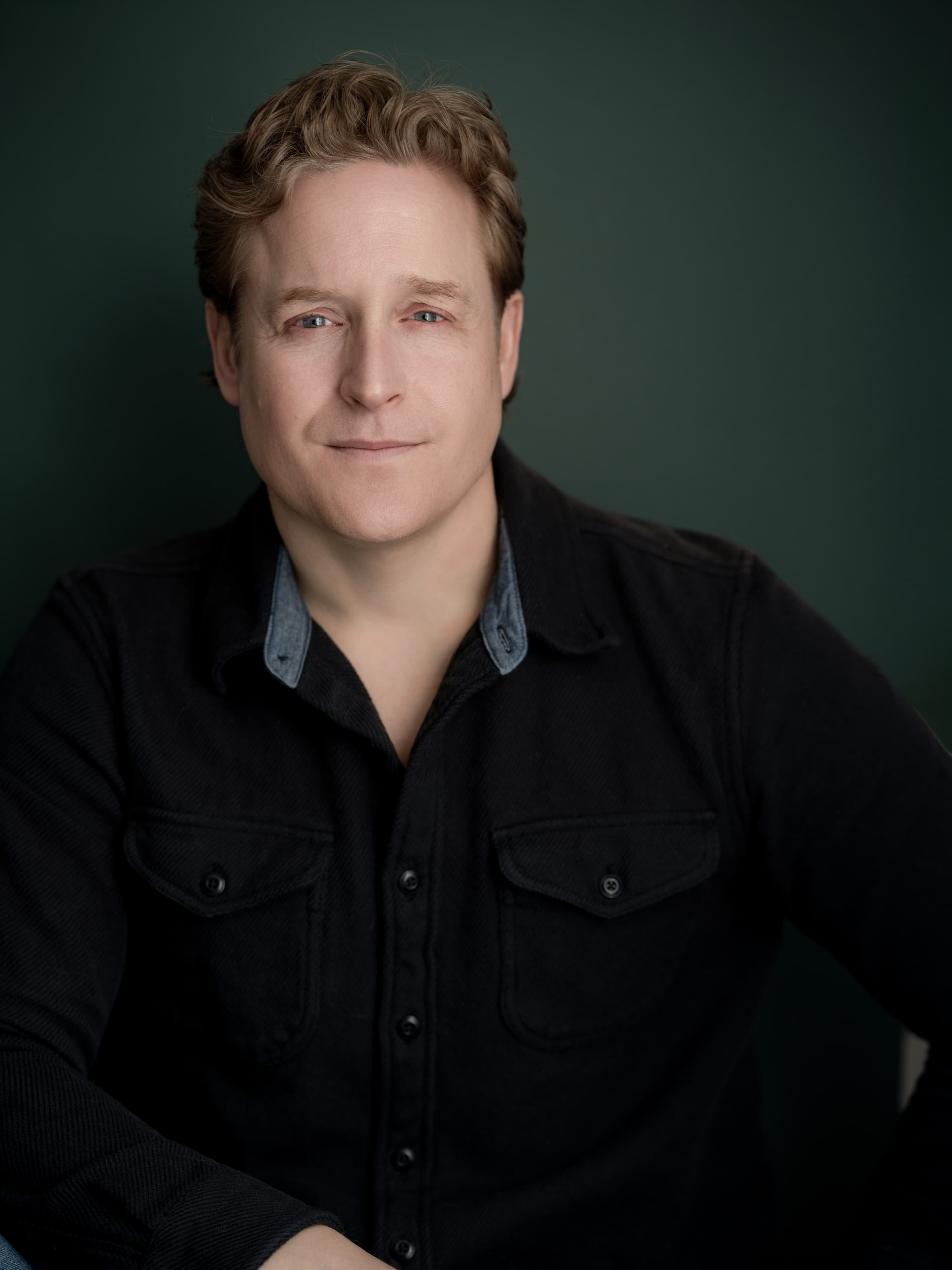 Attorney portrait with a composed, professional look